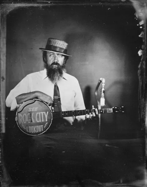 Matt Downer portrait with banjo