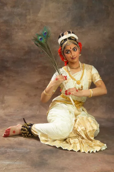Ranjani Murthy posing with peacock feather