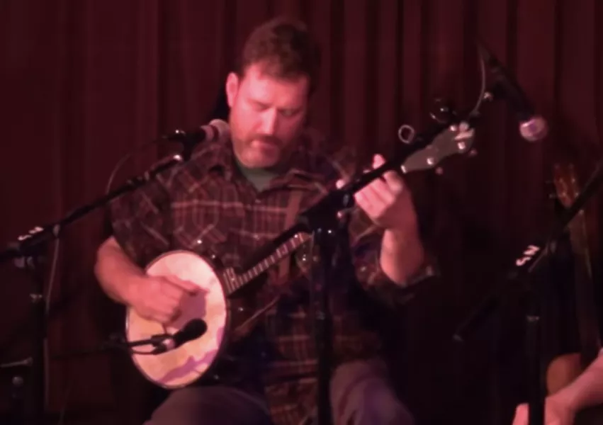 Solo banjo performance onstage