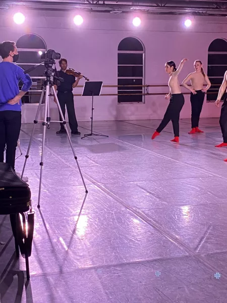 Videographer/Choreographer Yanis Eric Pikieris in studio filming his own ballet "Castles in the Air", commissioned for virtual premiere. Musician, Anthony Seepersad, Dancers Miranda Montes de Oca & Selah Jane Oliver in foreground.