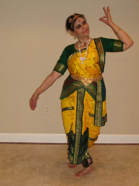 Bhavani Murthy in a pose where she hears the beautiful flute music being played by Lord Krishna in a dance on Krishna