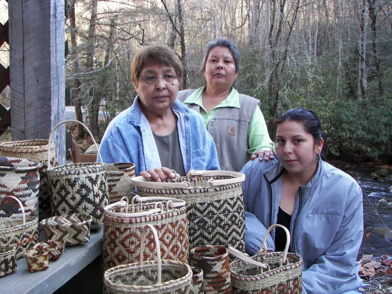 Three generations of basket makers – From left: Geraldine Walkingstick, daughter Mary W. Thompson, and Mary’s daughter, Sarah Thompson.