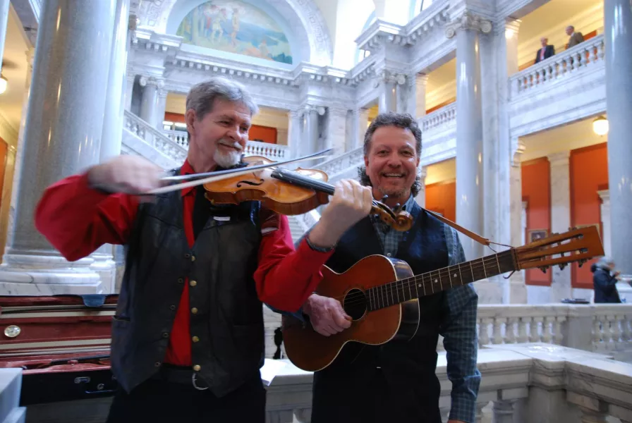 Scott Miller (guitar) with his mentor, Roger Cooper (fiddle), at Kentucky Arts Day in 2014