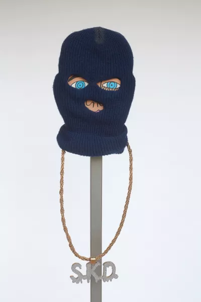 Howard Finster style face veiled behind artist's childhood ski mask